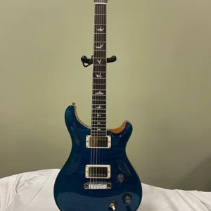 Taylor 214 CE natural finish in dark blue color