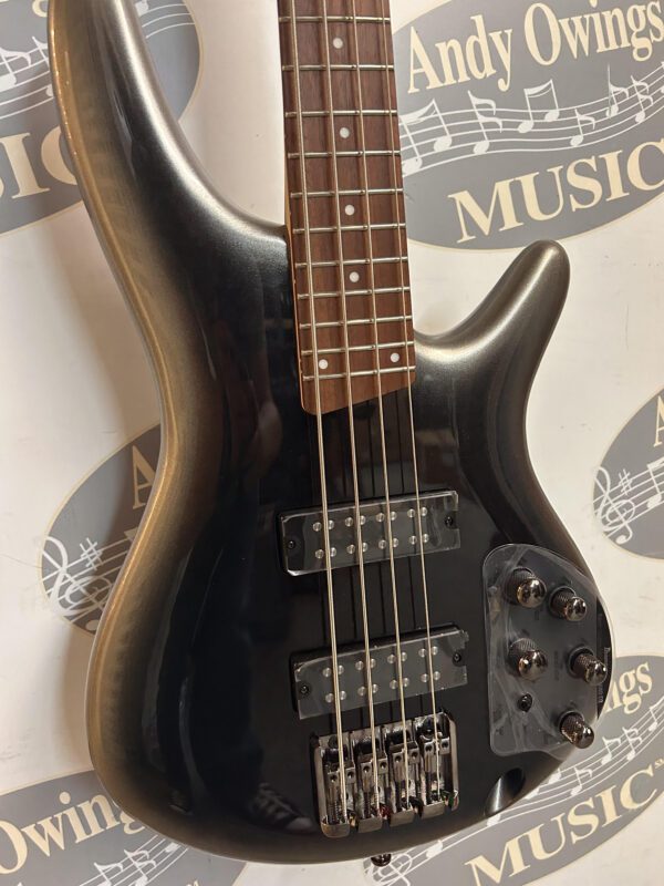An Ibanez Standard SR-300 EB metallic black bass guitar with a logo on it.