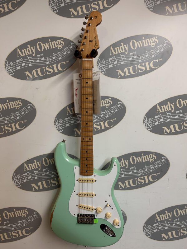 Fender Road Worn 50's Stratocaster - A guitar with a tag on it.