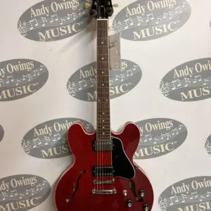 Taylor 214 CE natural finish in red color