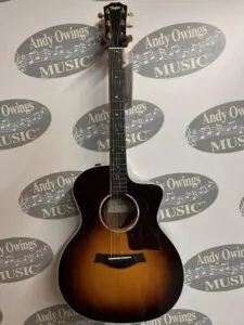 A taylor taylor acoustic guitar with a sunburst finish.