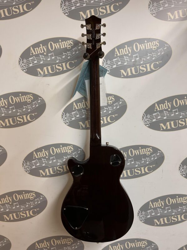 A black guitar with a logo on it.